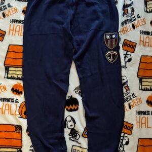 Stylish Navy Leggings with Shield Patch